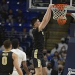 
              Purdue's Zach Edey (15) gets an easy dunk during the first half of an NCAA college basketball game against Penn State, Saturday, Jan. 8, 2022, in State College, Pa. (AP Photo/Gary M. Baranec)
            
