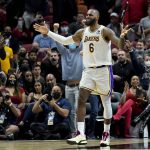 
              Los Angeles Lakers forward LeBron James (6) reacts to a call during the second half of an NBA basketball game against the Miami Heat, Sunday, Jan. 23, 2022, in Miami. Miami won 113-107. (AP Photo/Lynne Sladky)
            