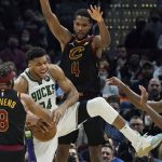 
              Cleveland Cavaliers' Lamar Stevens (8) strips the ball from Milwaukee Bucks' Giannis Antetokounmpo (34) under pressure from Evan Mobley (4) and Rajon Rondo (1) in the second half of an NBA basketball game, Wednesday, Jan. 26, 2022, in Cleveland. The Cavaliers won 115-99. (AP Photo/Tony Dejak)
            