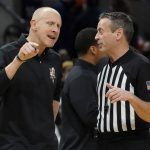 
              Louisville head coach Chris Mack argues with a ref during the second half of an NCAA college basketball game Monday Jan. 24, 2022, in Charlottesville, Va. Virginia defeated Louisville 64-52. (AP Photo/Steve Helber)
            