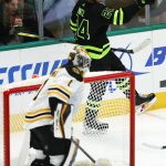 
              Dallas Stars forward Roope Hintz (24) celebrates after scoring a goal as Boston Bruins goaltender Jeremy Swayman (1) looks on during the third period of an NHL hockey game, Sunday, Jan. 30, 2022, in Dallas. (AP Photo/Brandon Wade)
            
