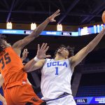 
              UCLA guard Jules Bernard, right, shoots as Oregon State forward Glenn Taylor Jr. defends during the first half of an NCAA college basketball game Saturday, Jan. 15, 2022, in Los Angeles. (AP Photo/Mark J. Terrill)
            