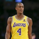 
              FILE - Los Angeles Lakers guard Rajon Rondo (4) stands during the first half of a preseason NBA basketball game against the Golden State Warriors in Los Angeles, Tuesday, Oct. 12, 2021. Cleveland completed its acquisition of the 35-year-old Rondo on Monday, Jan. 3, 2021, finalizing their trade with the Los Angeles Lakers and what became a three-team deal also involving the New York Knicks.(AP Photo/Ringo H.W. Chiu, File)
            