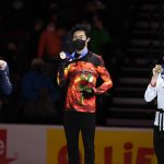 
              First place, Nathan Chen stands with second place, Ilia Malinin left, third place, Vincent Zhou during the medal ceremony for the men's free skate program during the U.S. Figure Skating Championships Sunday, Jan. 9, 2022, in Nashville, Tenn. (AP Photo/Mark Zaleski)
            