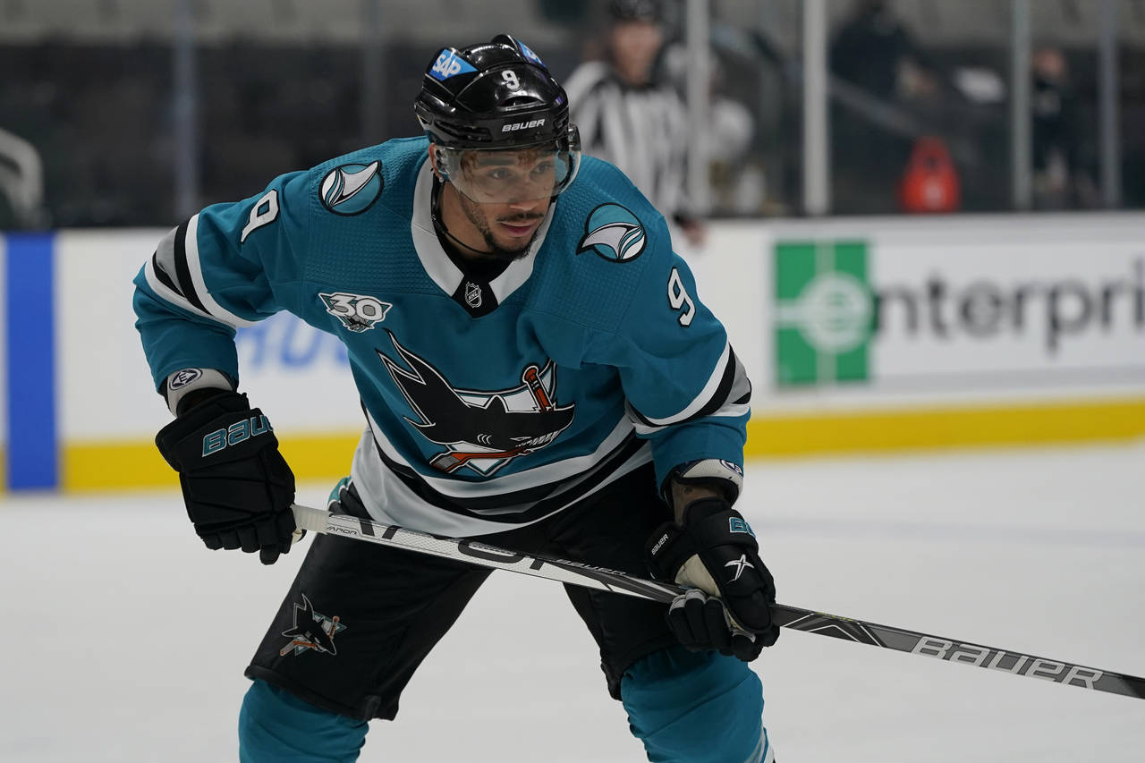 FILE - In this May 12, 2021, file photo, San Jose Sharks' Evander Kane (9) looks on during an NHL h...