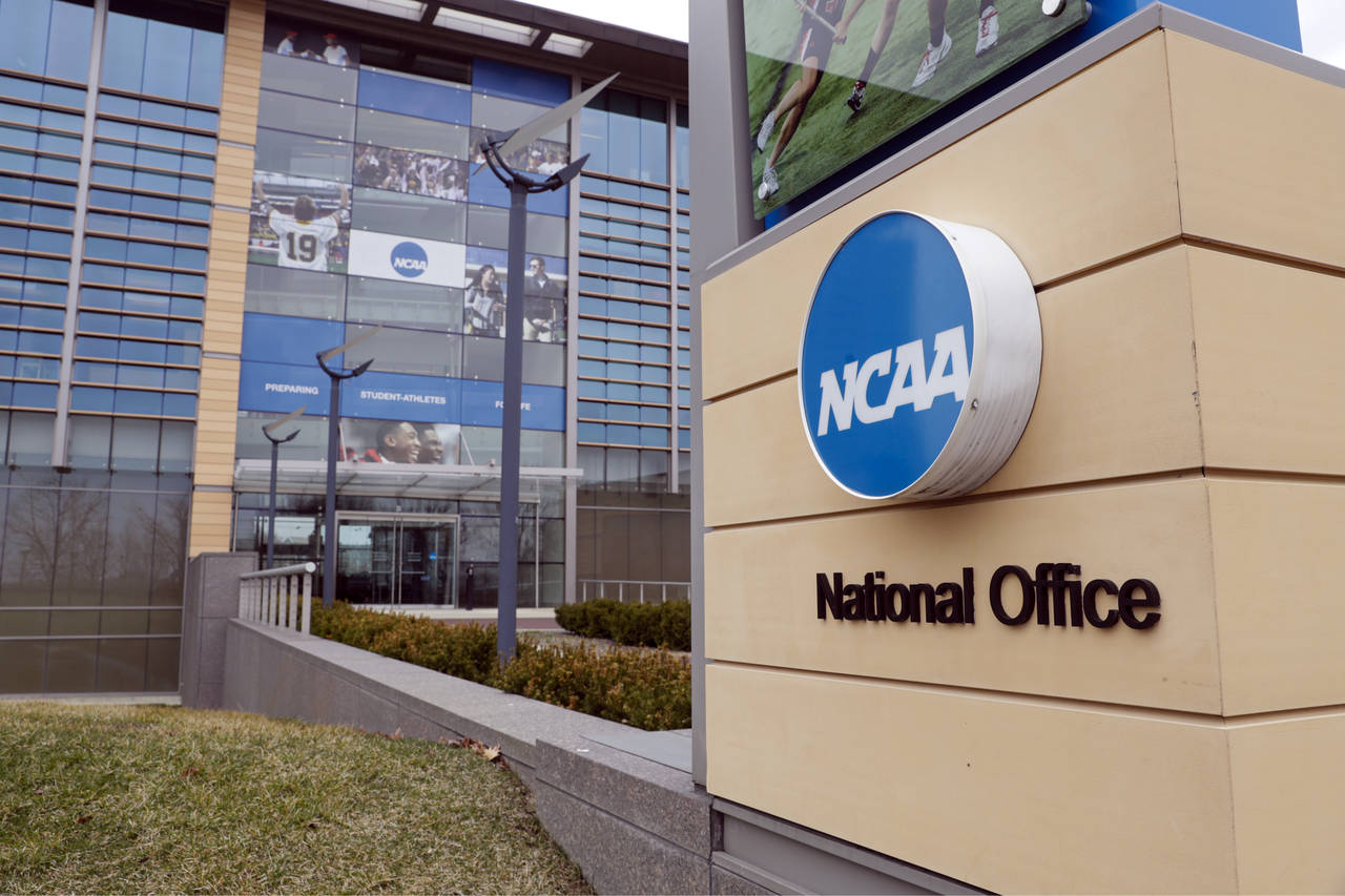 FILE - The national office of the NCAA in Indianapolis is shown on March 12, 2020. NCAA enforcement...