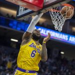 
              Los Angeles Lakers forward LeBron James (6) dunks for a basket in the first quarter of an NBA basketball game against the Sacramento Kings in Sacramento, Calif., Wednesday, Jan. 12, 2022. (AP Photo/José Luis Villegas)
            