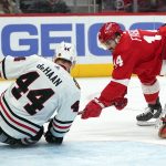 
              Detroit Red Wings center Robby Fabbri (14) scores pas Chicago Blackhawks defenseman Calvin de Haan (44) in the second period of an NHL hockey game Wednesday, Jan. 26, 2022, in Detroit. (AP Photo/Paul Sancya)
            