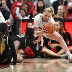 
              Louisville guard Hailey Van Lith, right, gets the ball away from Wake Forest forward Christina Morra (23) during the second half of an NCAA college basketball game in Louisville, Ky., Sunday, Jan. 23, 2022. (AP Photo/Timothy D. Easley)
            