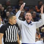 
              Florida head coach Mike White, right, reacts to a call against his team during the first half of an NCAA college basketball game against Auburn, Saturday, Jan. 8, 2022, in Auburn, Ala. (AP Photo/Julie Bennett)
            