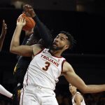 
              Arizona State center Enoch Boakye, center, pulls down a rebound against Southern California forward Isaiah Mobley, right, and guard Isaiah White, left, during the first half of an NCAA college basketball game in Los Angeles, Monday, Jan. 24, 2022. (AP Photo/Alex Gallardo)
            