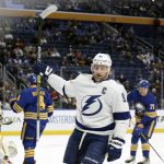 
              Tampa Bay Lightning center Steven Stamkos (91) celebrates his goal during the second period of an NHL hockey game against the Buffalo Sabres on Tuesday, Jan. 11, 2022, in Buffalo, N.Y. (AP Photo/Joshua Bessex)
            