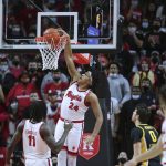 
              Rutgers forward Ron Harper Jr. (24) dunks against Iowa during the first half of an NCAA college basketball game Wednesday, Jan. 19, 2022, in Piscataway, N.J. (Andrew Mills/NJ Advance Media via AP)
            