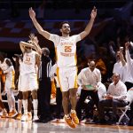 
              Tennessee guard Santiago Vescovi (25) reacts to hitting a go-ahead 3-point shot to give Tennessee the lead during an NCAA college basketball game against Mississippi on Wednesday, Jan. 5, 2022, in Knoxville, Tenn. Tennessee won 66-60 in overtime. (AP Photo/Wade Payne)
            