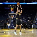 
              Golden State Warriors guard Klay Thompson warms up before an NBA basketball game between the Warriors and the Miami Heat in San Francisco, Monday, Jan. 3, 2022. (AP Photo/Jeff Chiu)
            