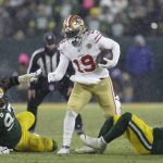 
              San Francisco 49ers' Deebo Samuel runs during the second half of an NFC divisional playoff NFL football game against the Green Bay Packers Saturday, Jan. 22, 2022, in Green Bay, Wis. (AP Photo/Matt Ludtke)
            