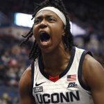 
              Connecticut's Christyn Williams reacts in the first half of an NCAA college basketball game against Xavier, Saturday, Jan. 15, 2022, in Hartford, Conn. (AP Photo/Jessica Hill)
            