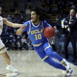 
              UCLA guard Tyger Campbell (10) drives to the basket against California guard Jordan Shepherd (31) during the first half of an NCAA college basketball game in Berkeley, Calif., Saturday, Jan. 8, 2022. (AP Photo/Jed Jacobsohn)
            