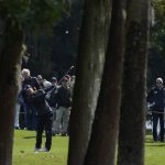 
              Celine Boutier of France is seen between trees as she hits on the 16th hole fairway during the third round of the Gainbridge LPGA golf tournament, Saturday, Jan. 29, 2022, in Boca Raton, Fla. (AP Photo/Rebecca Blackwell)
            