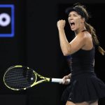 
              Danielle Collins of the U.S. reacts after winning a point against Iga Swiatek of Poland during their semifinal match at the Australian Open tennis championships in Melbourne, Australia, Thursday, Jan. 27, 2022. (AP Photo/Hamish Blair)
            