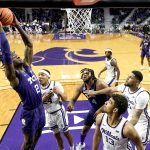 
              TCU forward Emanuel Miller (2) puts up a basket during the first half of an NCAA college basketball game against Kansas State Wednesday, Jan. 12, 2022, in Manhattan, Kan. (AP Photo/Charlie Riedel)
            