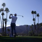 
              Tom Hoge follows his shot on the 18th tee during the third round of the American Express golf tournament at La Quinta Country Club, Saturday, Jan. 22, 2022, in La Quinta, Calif. (AP Photo/Marcio Jose Sanchez)
            