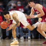 
              Nebraska's Trey McGowens (2) recovers a loose ball against Indiana's Trey Galloway (32) during the second half of an NCAA college basketball game, Monday, Jan. 17, 2022, in Lincoln, Neb. Indiana defeated Nebraska 78-71. (AP Photo/Rebecca S. Gratz)
            