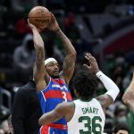 
              Washington Wizards guard Bradley Beal (3) looks to pass as he is guarded by Boston Celtics guard Marcus Smart (36) during the first half of an NBA basketball game, Sunday, Jan. 23, 2022, in Washington. (AP Photo/Nick Wass)
            