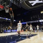 
              Providence guard Al Durham (1) scores a basket during the first half of an NCAA college basketball game against Xavier, Wednesday, Jan. 26, 2022, in Cincinnati. (AP Photo/Jeff Dean)
            