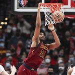 
              Cleveland Cavaliers center Jarrett Allen dunks on a rebound during the first half of the team's NBA basketball game against the Portland Trail Blazers in Portland, Ore., Friday, Jan. 7, 2022. (AP Photo/Amanda Loman)
            