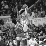 
              FILE - Larry Bird of the Boston Celtics, right, is defended by Wes Matthews, of the Atlanta Hawks, left, in second half NBA playoff action at Boston Garden, April 20, 1983. Bird led all scorers in the game with 26 points as Boston defeated Atlanta 103-96 to take a 1-0 lead in the best-of-seven series. (AP Photo/Mike Kullen, File)
            