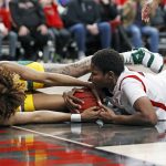 
              Baylor's NaLyssa Smith (1) and Texas Tech's Khadija Faye (23) dive on the court for the ball during the first half of an NCAA college basketball game on Wednesday, Jan. 26, 2022, in Lubbock, Texas. (AP Photo/Brad Tollefson)
            