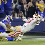 
              San Francisco 49ers' Jimmy Garoppolo, right, throws a pass that is intercepted during the second half of the NFC Championship NFL football game against the Los Angeles Rams Sunday, Jan. 30, 2022, in Inglewood, Calif. (AP Photo/Marcio Jose Sanchez)
            