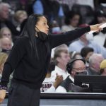 
              South Carolina head coach Dawn Staley communicates with players during the second half of an NCAA college basketball game against Mississippi, Thursday, Jan. 27, 2022, in Columbia, S.C. (AP Photo/Sean Rayford)
            