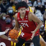 
              Minnesota guard Payton Willis steals the ball away from Rutgers guard Ron Harper Jr. (24) in the first half of an NCAA college basketball game Saturday, Jan. 22, 2022, in Minneapolis. (AP Photo/Bruce Kluckhohn)
            