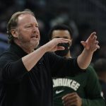 
              Milwaukee Bucks head coach Mike Budenholzer reacts during the first half of an NBA basketball game against the Golden State Warriors Thursday, Jan. 13, 2022, in Milwaukee. (AP Photo/Morry Gash)
            