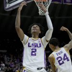 
              LSU guard Eric Gaines (2) and forward Shareef O'Neal (24) celebrate taking the lead during the second half of an NCAA college basketball game against Texas A&M in Baton Rouge, La., Wednesday, Jan. 26, 2022. (AP Photo/Matthew Hinton)
            