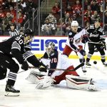 
              New Jersey Devils left wing Tomas Tatar (90) scores a goal past Columbus Blue Jackets goaltender Joonas Korpisalo (70) during the first period of an NHL hockey game Thursday, Jan. 6, 2022, in Newark, N.J. (AP Photo/Bill Kostroun)
            