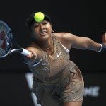 
              Naomi Osaka of Japan plays a forehand during her singles match against Alize Cornet of France at Summer Set tennis tournament ahead of the Australian Open in Melbourne, Australia, Tuesday, Jan. 4, 2022. (AP Photo/Hamish Blair)
            