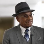 
              FILE - Willie O'Ree arrives for a meeting on Capitol Hill in Washington,July 25, 2019. O'Ree says the ongoing pandemic hasn't diminished what he says will be a "simply amazing" honor watching his No. 22 jersey retired by the Bruins. O'Ree, who broke the NHL's color barrier on Jan. 18, 1958, was slated to attend when he became the 12th player in team history to have his number retired prior to Boston's game against Carolina on Tuesday, Jan. 18, 2022. But persisting concerns about the pandemic changed those plans. He will now participate from his home in San Diego. (AP Photo/Susan Walsh, File)
            
