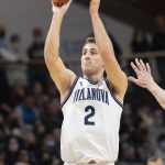
              Villanova guard Collin Gillespie (2) takes a shot for three points during the second half of an NCAA college basketball game against Creighton, Wednesday, Jan. 5, 2022, in Villanova, Pa. (AP Photo/Laurence Kesterson)
            