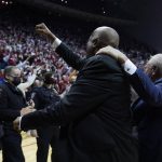 
              Indiana head coach Mike Woodson, center, celebrates as he leaves the court following an NCAA college basketball game against Purdue, Thursday, Jan. 20, 2022, in Bloomington, Ind. (AP Photo/Darron Cummings)
            