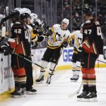 
              Pittsburgh Penguins center Evgeni Malkin (71) is congratulated on his goal against the Anaheim Ducks in the second period of an NHL hockey game in Anaheim, Calif., Tuesday, Jan. 11, 2022. (AP Photo/Kyusung Gong)
            