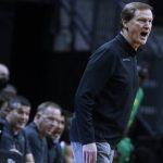 
              Oregon coach Dana Altman shouts to players during the first half of the team's NCAA college basketball game against Utah in Eugene, Ore., Saturday, Jan. 1, 2022. (AP Photo/Thomas Boyd)
            