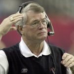 
              FILE - Atlanta Falcons coach Dan Reeves adjusts his headset at the start of play against the Detroit Lions at the Georgia Dome in Atlanta Sunday, Dec. 22, 2002.  Reeves, who won a Super Bowl as a player with the Dallas Cowboys but was best known for a long coaching career highlighted by four more appearances in the title game with the Denver Broncos and Atlanta Falcons, died Saturday, Jan. 1, 2022.   (AP Photo/Ric Feld, File)
            