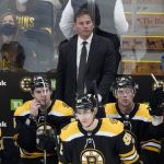 
              Boston Bruins head coach Bruce Cassidy looks on from the bench during the third period of an NHL hockey game against the Montreal Canadiens, Wednesday, Jan. 12, 2022, in Boston. (AP Photo/Mary Schwalm)
            