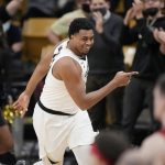 
              Colorado forward Evan Battey reacts after blocking a shot by Washington State in the second half of an NCAA college basketball game Thursday, Jan. 6, 2022, in Boulder, Colo. (AP Photo/David Zalubowski)
            
