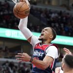 
              Washington Wizards center Daniel Gafford dunks against the Chicago Bulls during the first half of an NBA basketball game in Chicago, Friday, Jan. 7, 2022. (AP Photo/Nam Y. Huh)
            