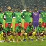 
              Cameroon players pose for photographers before the start of their African Cup of Nations 2022 round of 16 soccer match against Comoros at the Olembe stadium in Yaounde, Cameroon, Monday, Jan. 24, 2022. (AP Photo/Themba Hadebe)
            