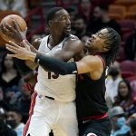 
              Portland Trail Blazers forward Trendon Watford, right, defends Miami Heat center Bam Adebayo (13) during the first half of an NBA basketball game, Wednesday, Jan. 19, 2022, in Miami. (AP Photo/Lynne Sladky)
            
